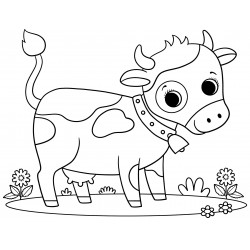 Cow grazes in a meadow