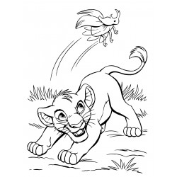 Simba plays with a bug