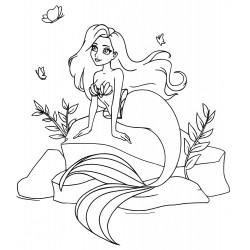 The mermaid is sitting on a large stone